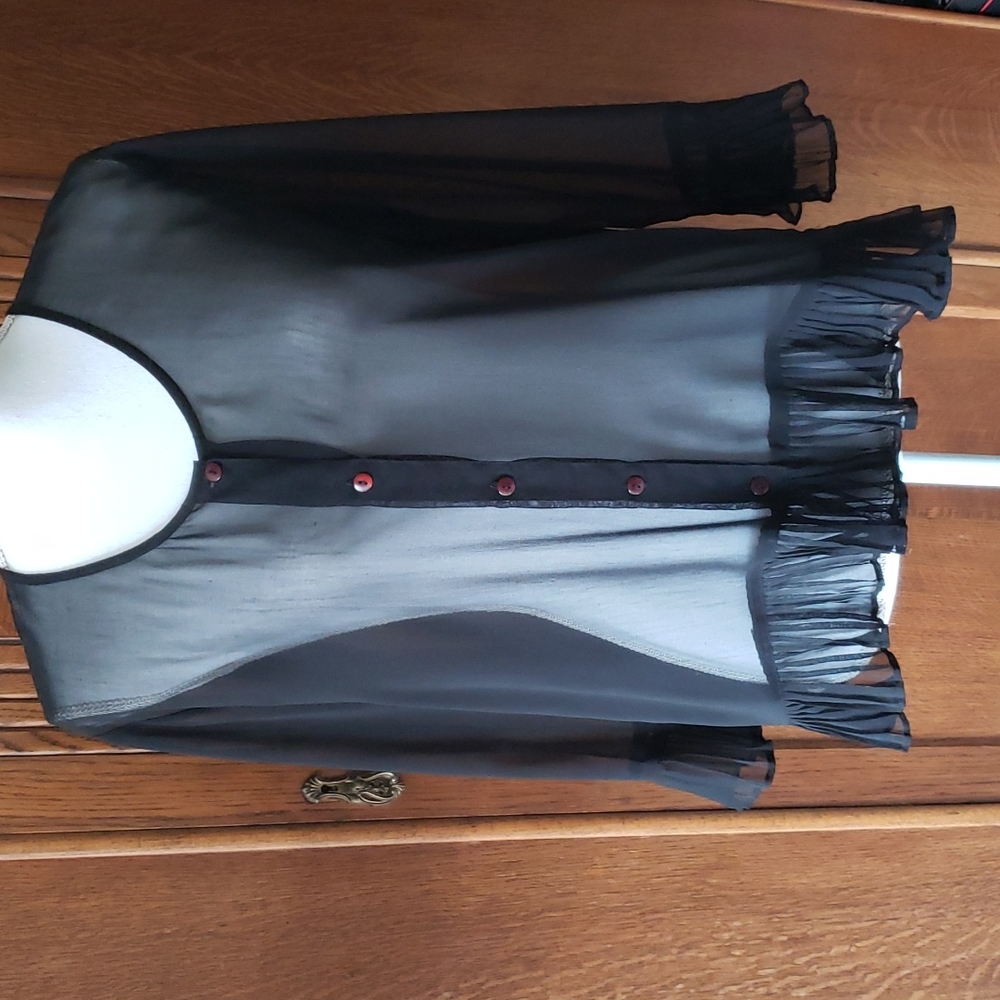 Sheer black top with embellishments